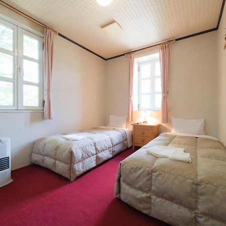 Guesthouse Curry Village Hokuto  Bagian luar foto